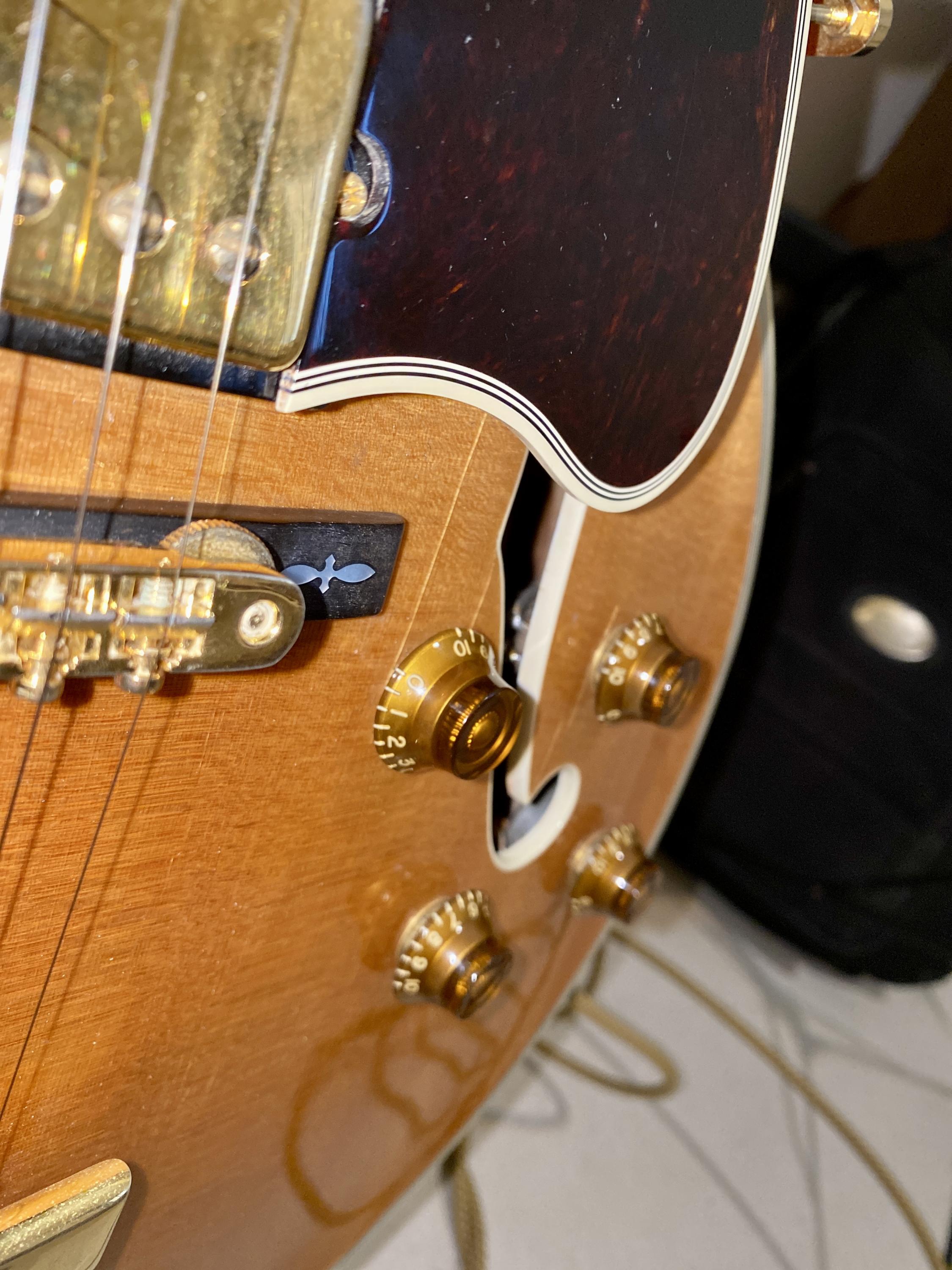 Guitar cracks or checks or damage - please help a clueless idiot-64a1cbe4-3c9c-4447-9745-00831fef0394-jpg